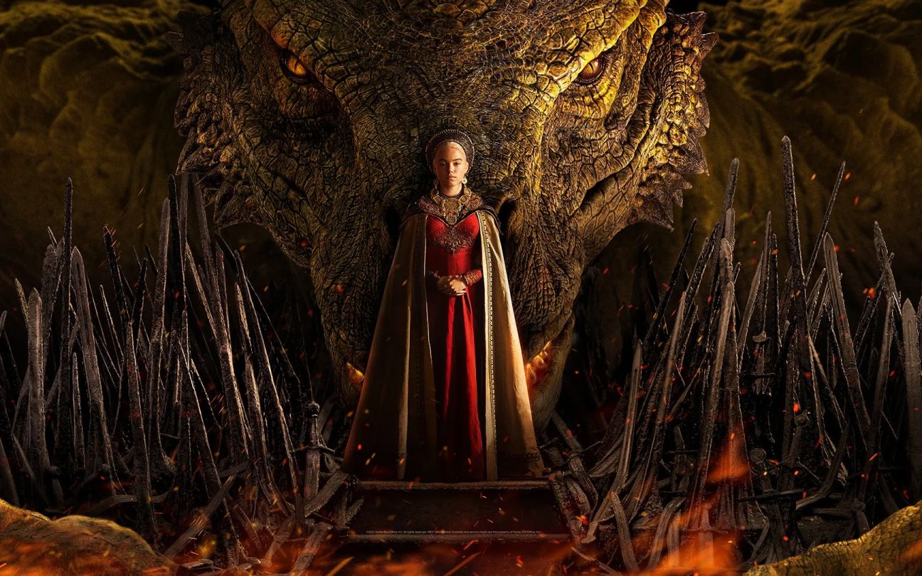 Emma D'Arcy in front of a dragon from House of the Dragon